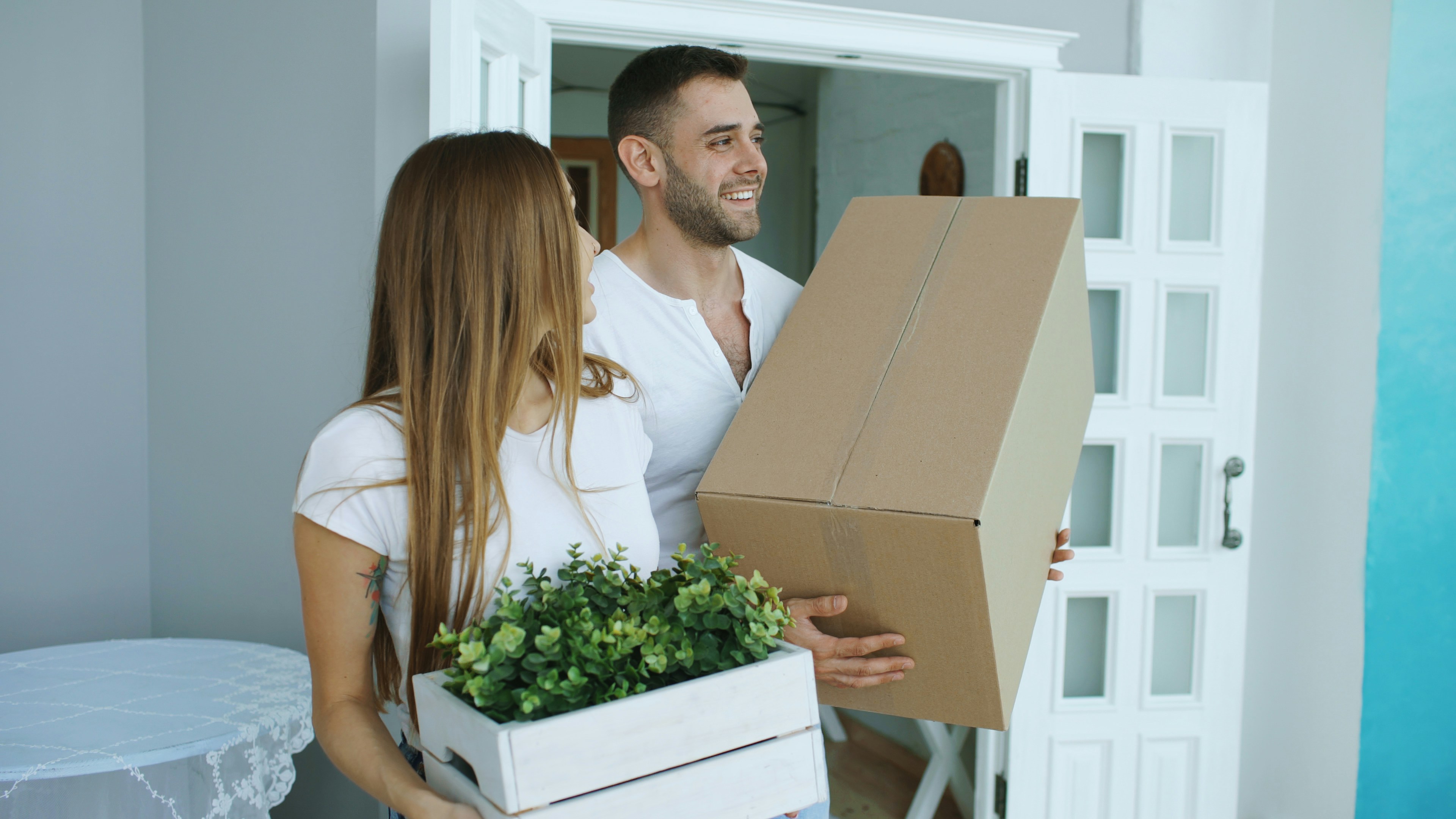 Couple moving into their new home